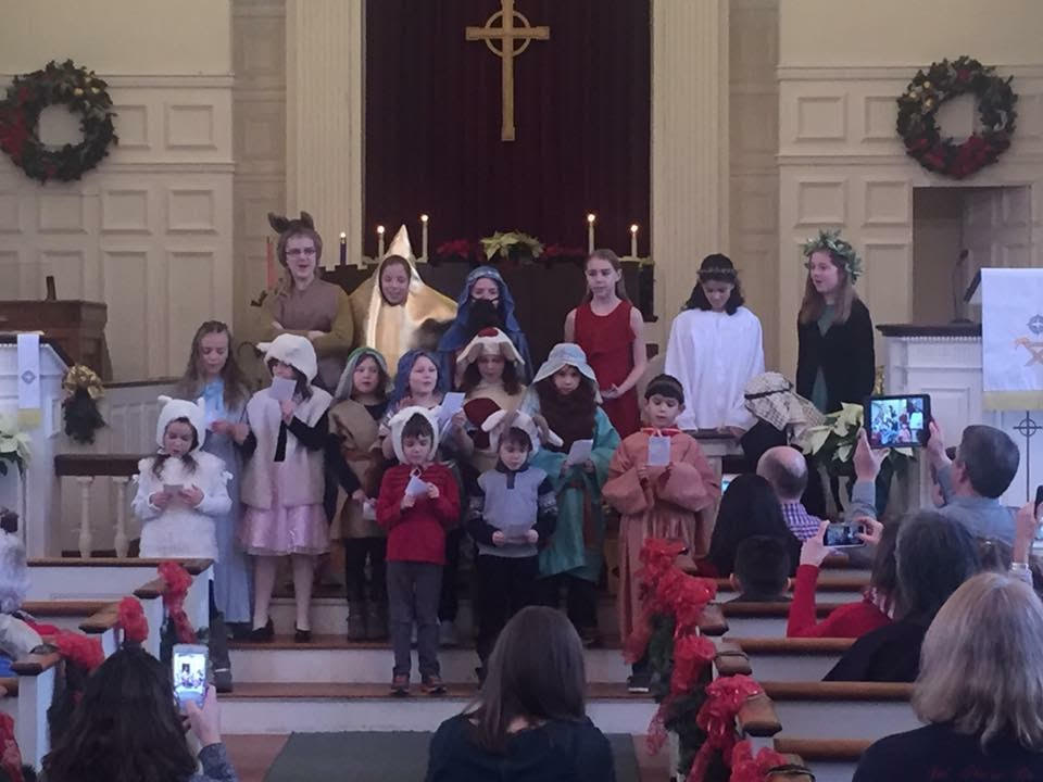 children singing in a church pageant