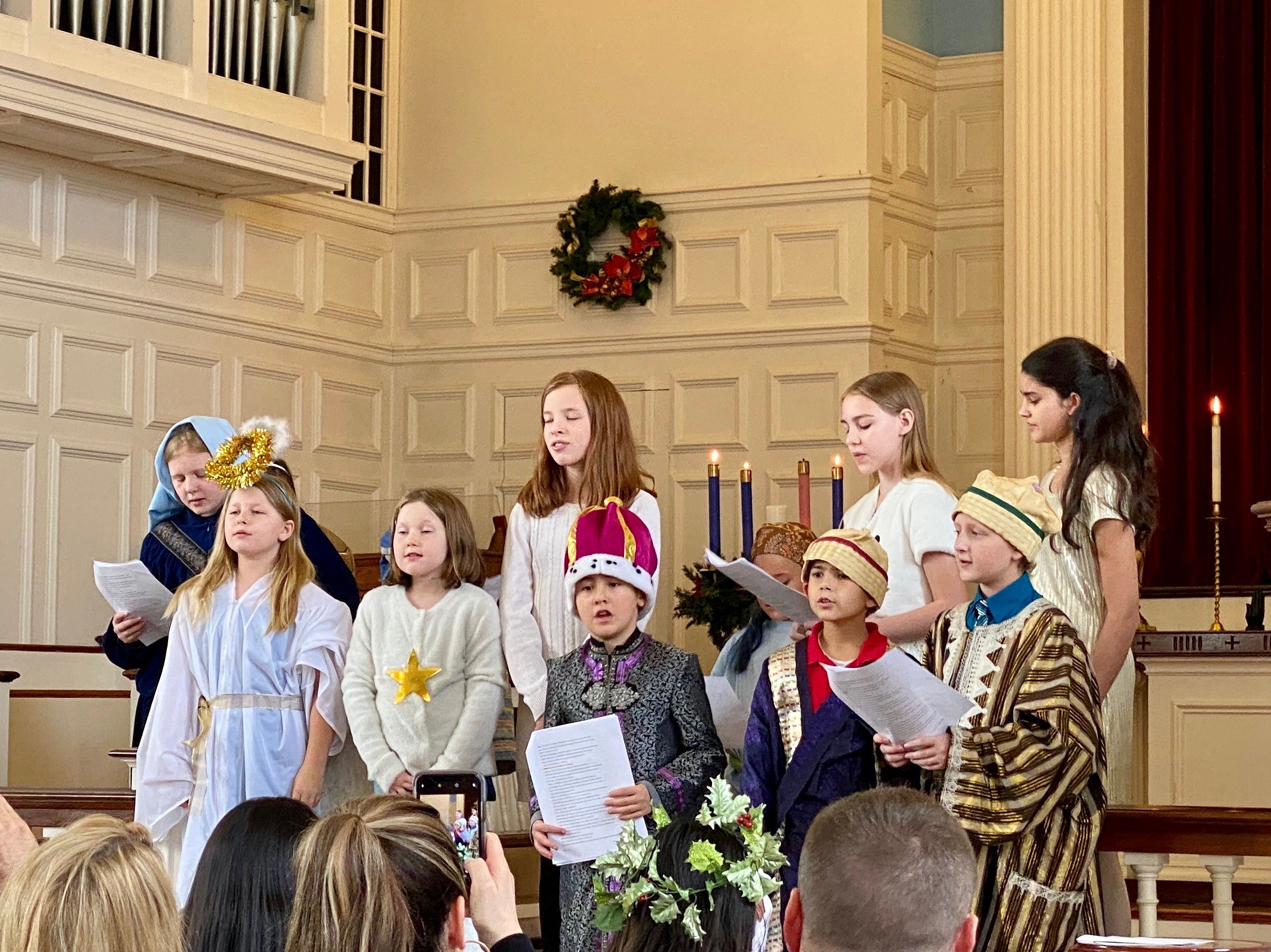 children singing in a church choir