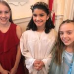 three young girls before singing a church choir