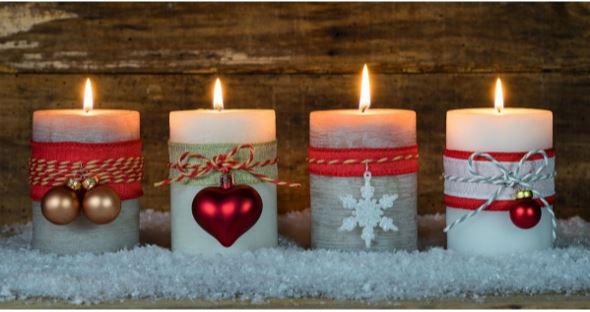 Four holiday candles